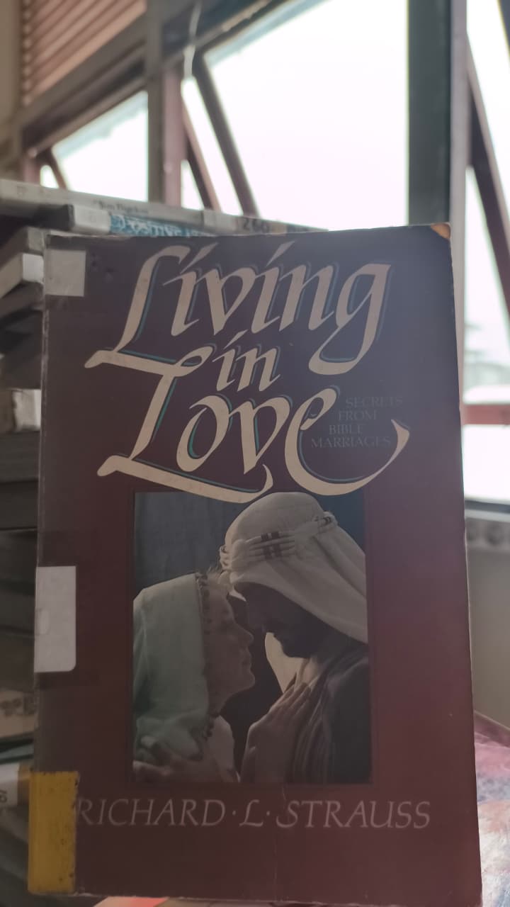 Cover buku Living in Love
