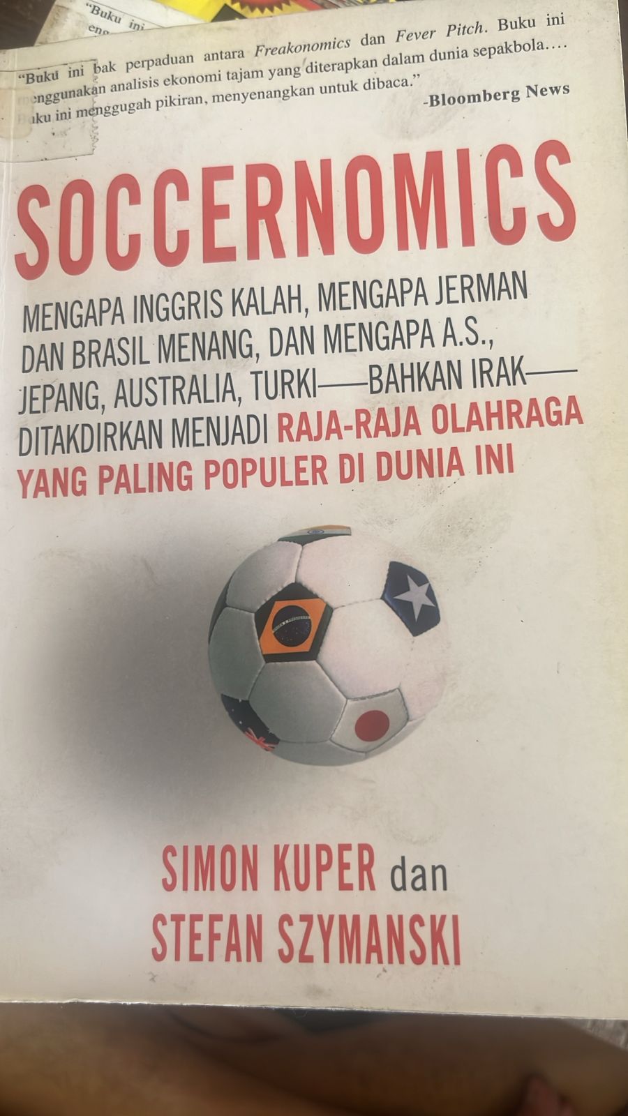 Cover buku SOCCERNOMICS